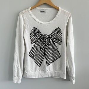 Lauren moshi white long sleeve crewneck shirt with black and white bow graphic